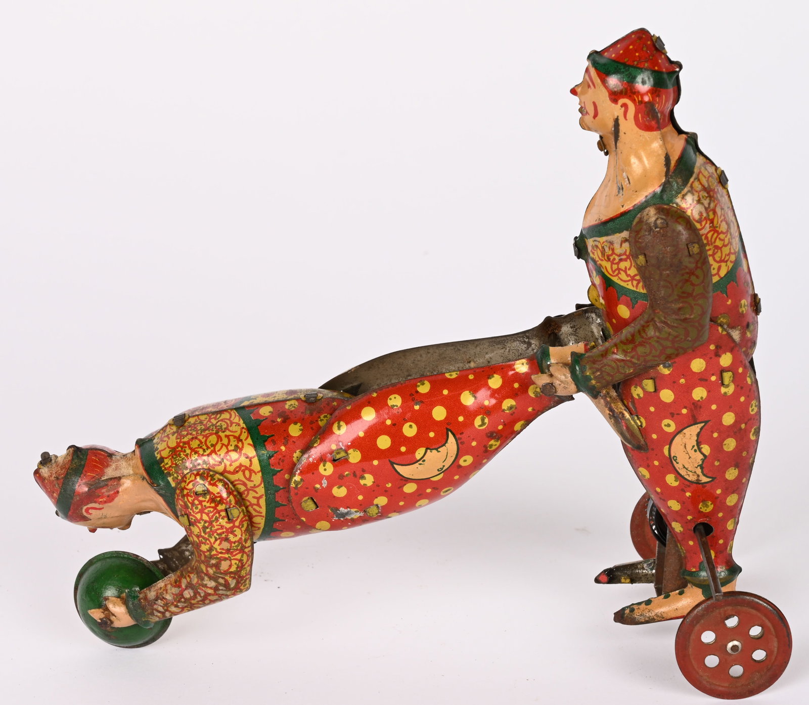 PREWAR JAPAN TIN WINDUP ACROBAT CLOWNS: Prewar Japan tin windup Acrobat Clowns. All original with great colors and graphics. One clown balances other clown on ball. Windup works. Large impressive toy. Has some touchup. 8" Excellent