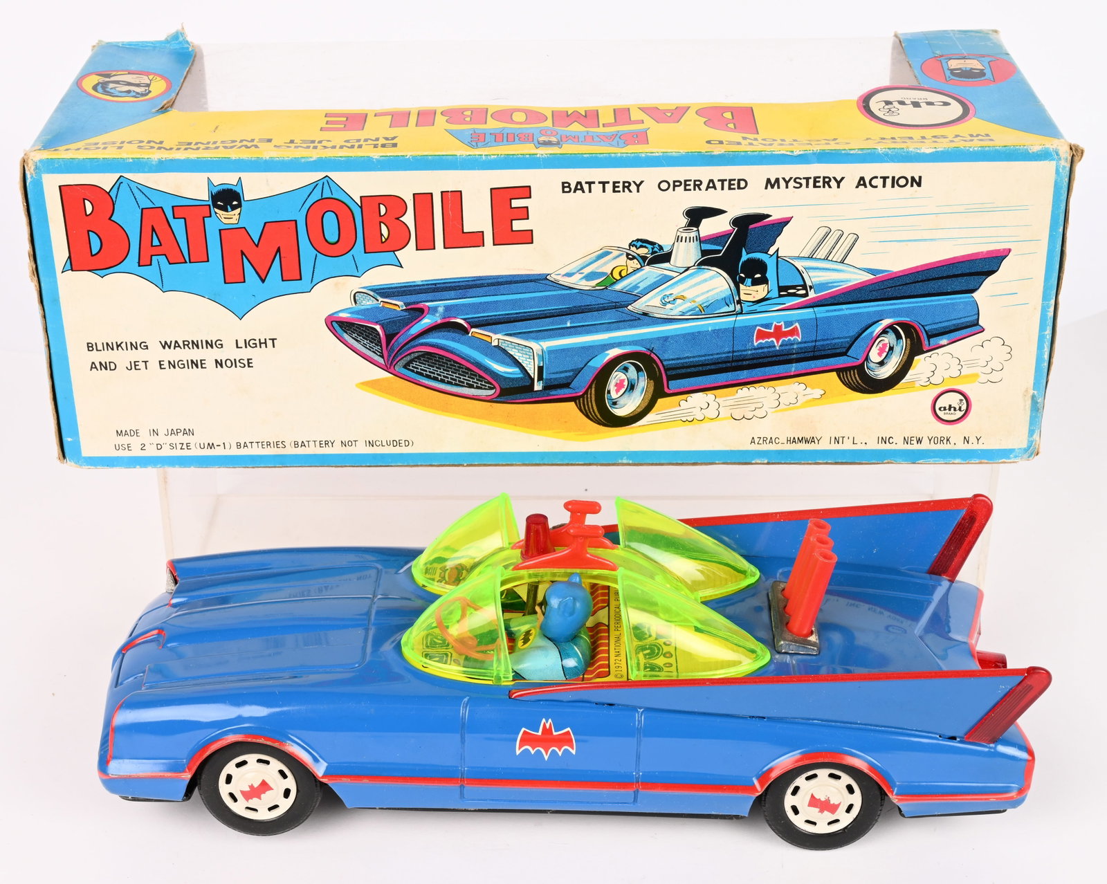 AHI BATTERY OP BATMOBILE w/ BOX: Japan battery operated Batmobile. All original and complete. Very clean condition. Has great Batman and Robin in the car. Battery box is clean. Worked when tested. Boxed with Inserts. 13 1/2" Excellen