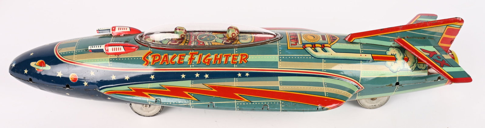 K OKADA TIN FRICTION SPACE FIGHTER XY-105: RARE Japan tin friction Space Fighter. Toy has very nice colors and graphics. Has 2 Spacemen Drivers under the canopy. A very large and impressive toy. Friction works well. Toy has replaced guns and