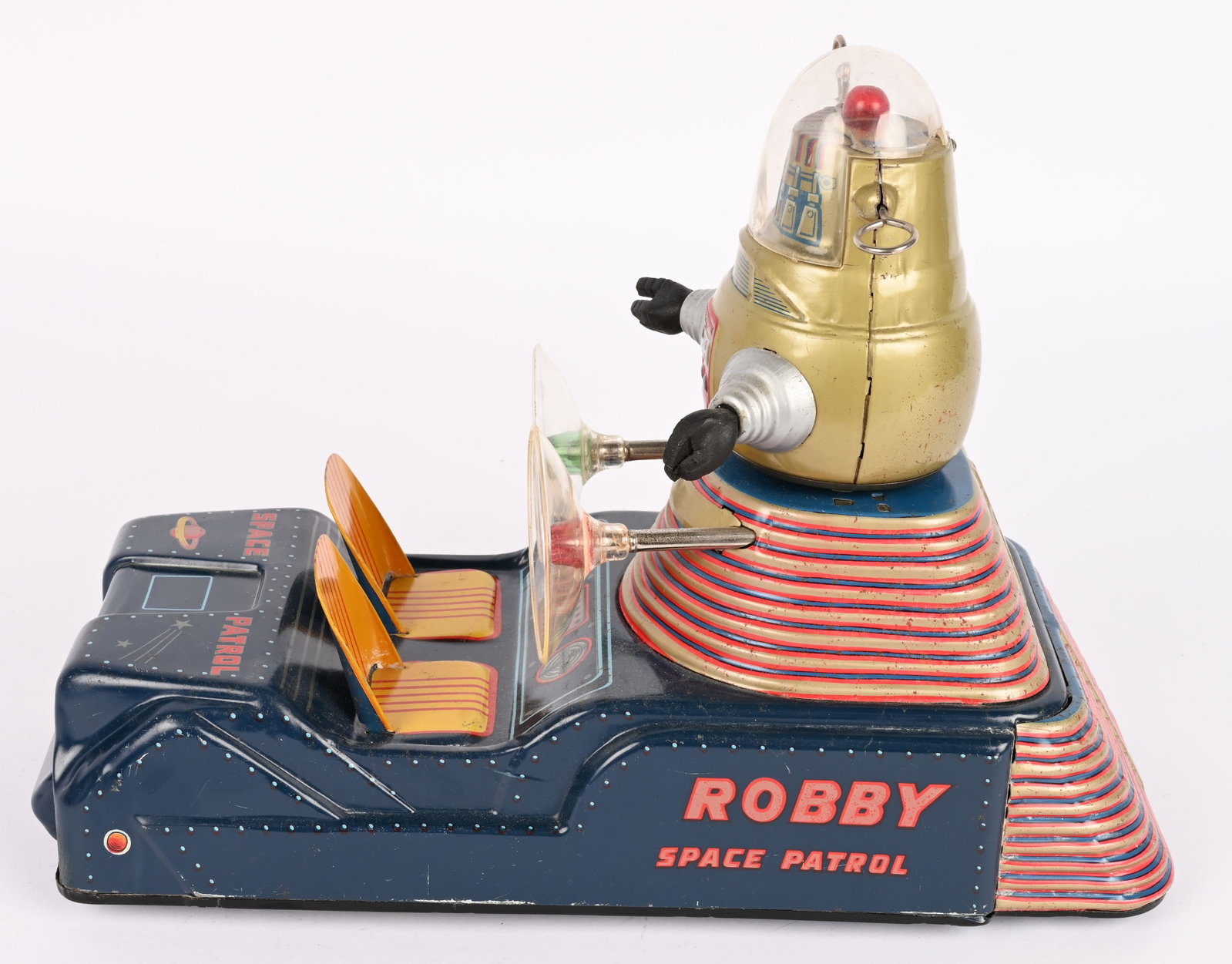 NOMURA BATTERY OP ROBBY SPACE PATROL: Japan battery operated Robby Space Patrol. All original and in very clean condition. Toy has nice colors. Battery box is clean but has one broken tab but is fixable. Worked when tested. The rear in