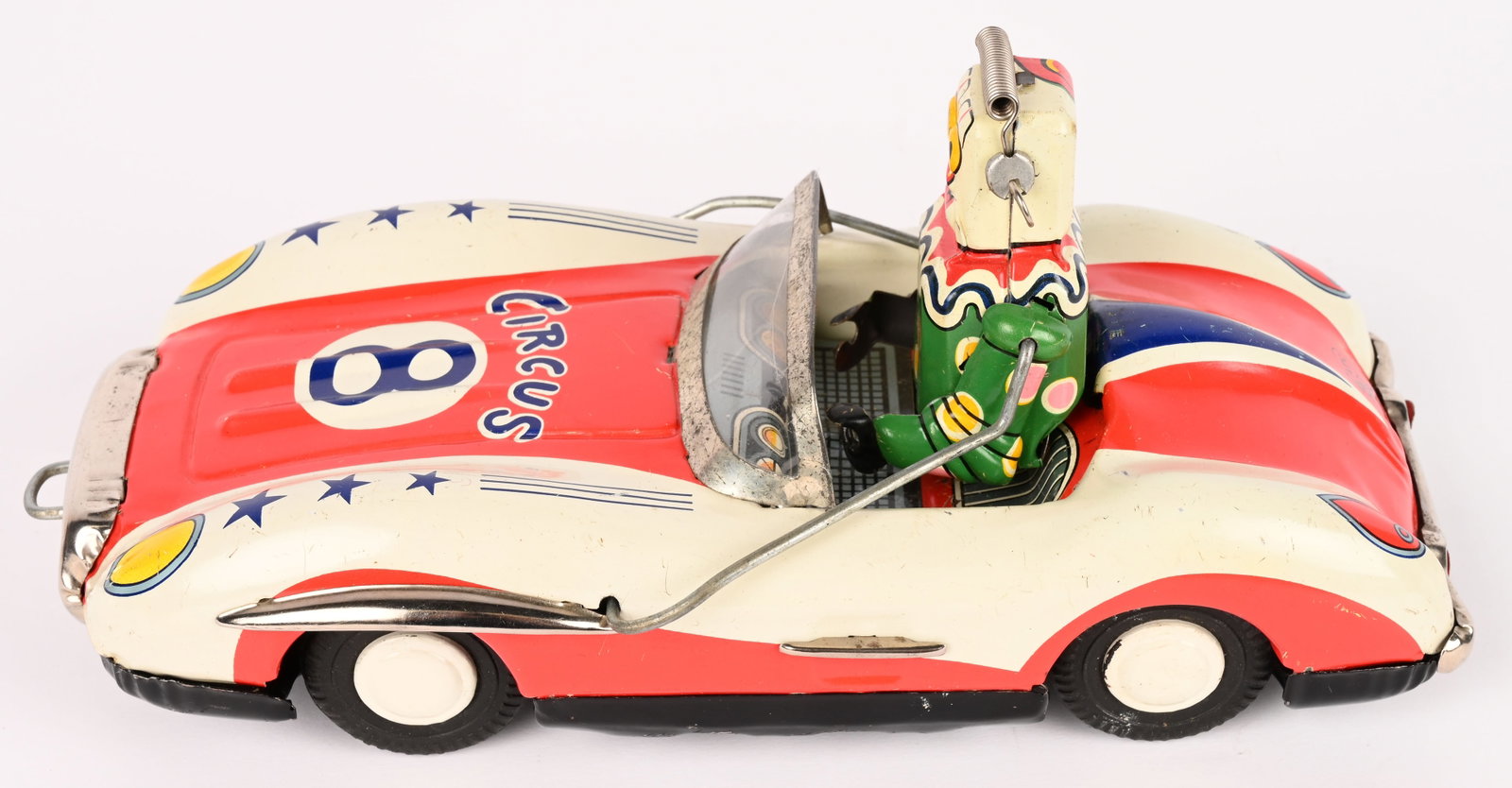 ATC TIN FRICTION CIRCUS CLOWN ROBOT CAR: ATC tin friction Circus Clown Robot Car. All original and complete. Very nice colors. Friction works. 8 1/2" Excellent