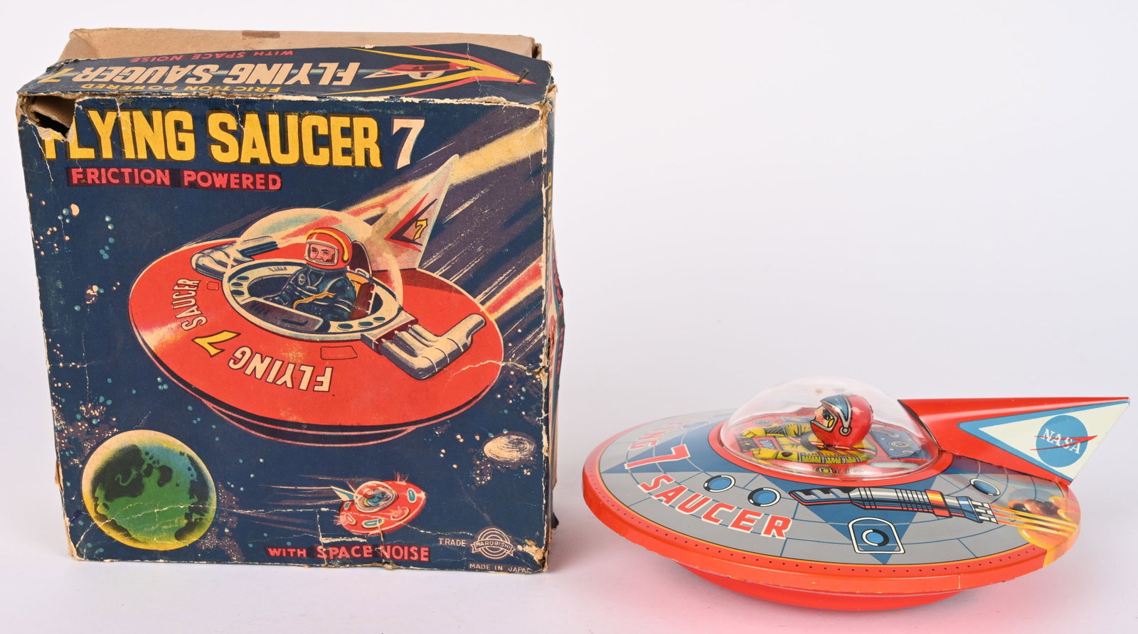 MARUBISHI TIN FRICTION FLYING SAUCER 7 w/ BOX: Japan tin friction Flying Saucer 7. All original with very nice colors and graphics. Friction works. Scarce Flying Saucer. Comes with Original Box with some wear. 7" Excellent
