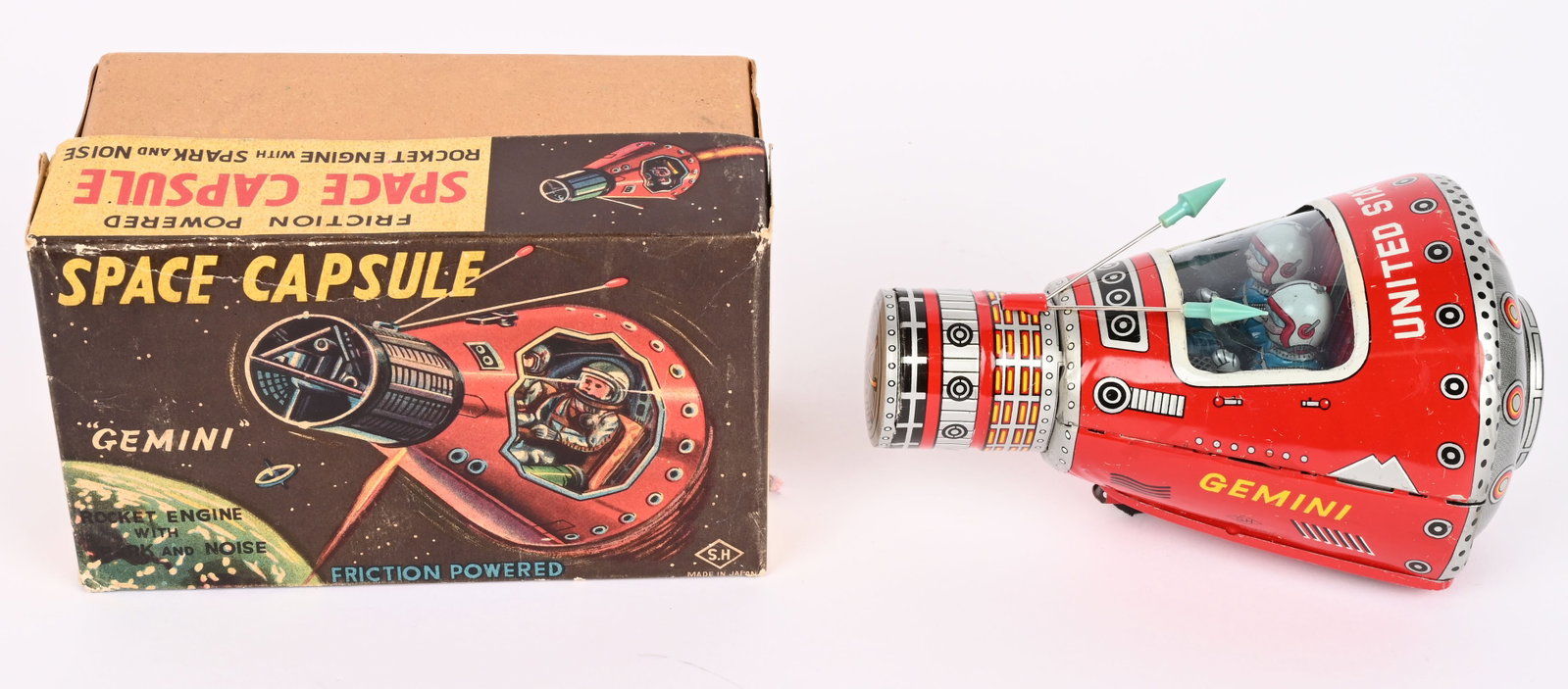 HORIKAWA FRICTION US GEMINI SPACE CAPSULE w/ BOX: Japan tin friction US Gemini Space Capsule. All original in great condition. Has 2 Astronauts inside. Friction works. With Box. 6 1/2" Excellent