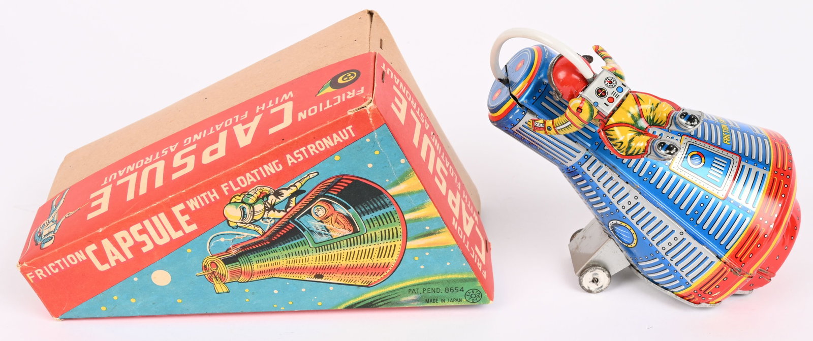 KANTO FRICTION CAPSULE & FLOATING ASTRONAUT w/BOX: Japan tin friction Capsule with Floating Astronaut. All original and looks never played with condition. Friction works. Boxed 8" Excellent