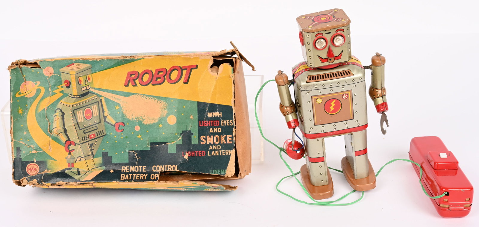 LINEMAR BATTERY OP LANTERN ROBOT w/ BOX: Japan battery operated Lantern Robot "aka Powder Robot". Silver and Gold version. All original and in decent condition. Colors are very bright. Comes with battery Box Remote Control with some loss on 