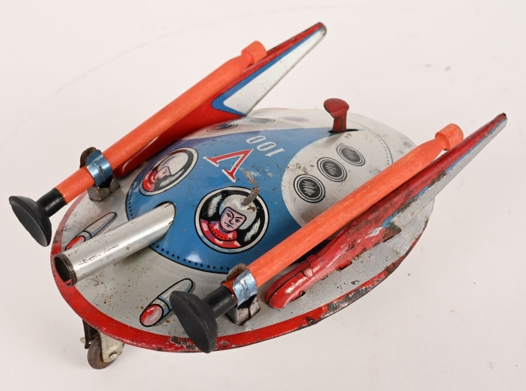 MT SPACE PATROL WITH SUCTORIAL MISSILES: Japan tin friction Space Patrol with Suctorial Missiles. Very rare space toy! Great looking V 100 Flying Saucer. Great design that hold 2 missiles and has launcher with trigger. All actions work. Toy 