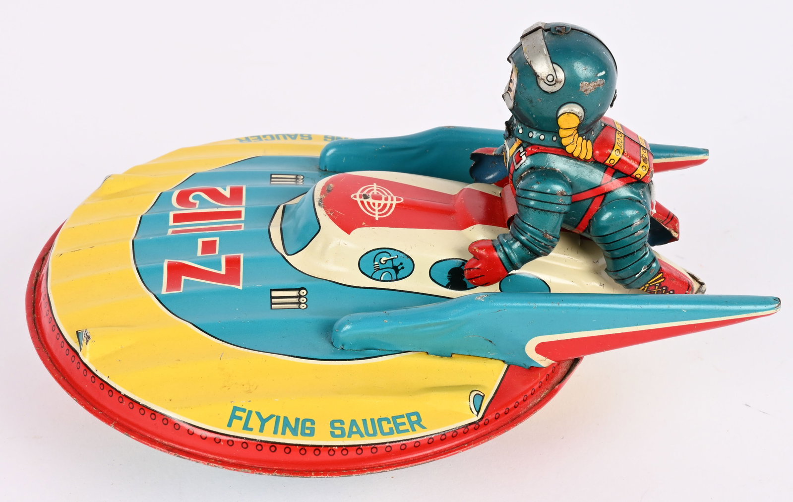 MASUDAYA TIN FRICTION BILLY'S FLYING SAUCER Z-112: Japan tin friction Billy's Flying Saucer Z-112. All original and complete with Billy figure. Toy has nice colors. Very clean condition. Friction works. Hard to find toy complete. 7" Excellent