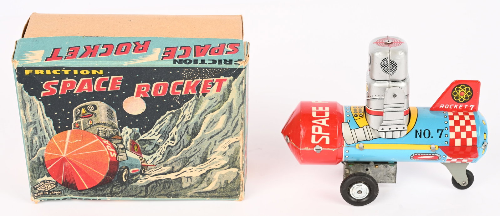 YONEYA TIN FRICTION SPACE ROCKET w/ BOX: Japan tin friction Space Rocket. All original in great condition. Friction works. Boxed 6 1/2" Excellent