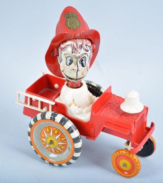 MARX WINDUP SMOKEY JOE CRAZY CAR: All original including ladder and bell. Excellent