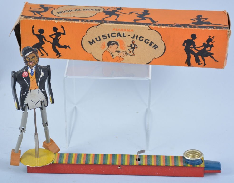 MARKS ALABAMA MUSICAL JIGGER w/Box: All original tin kazoo with wooden jigger. With Box. Excellent