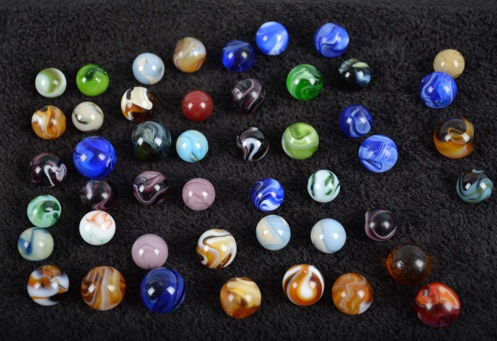 45 MACHINE MADE AGAT MARBLES: Largest around 3/4" Great colors. Excellent