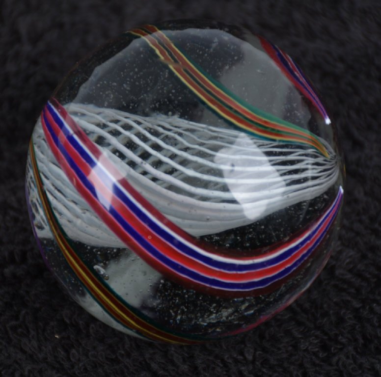 LARGE LATTICINO MARBLE: Around 2 1/2" Great colors. Minor flea bites. Excellent