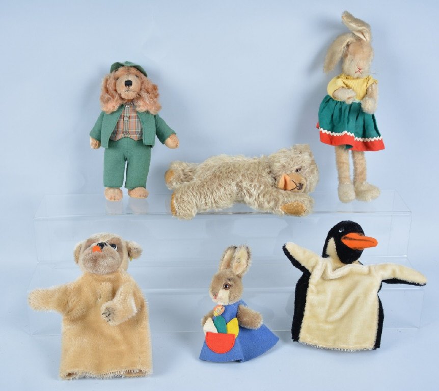 Lot of 6 STEIFF PUPPETS AND ANIMALS: Includes Rabbit Puppet, Dog Puppet, Penguin Puppet, Dressed Rabbit, Bear, and Dressed Dog. Some with Tags and Buttons. Largest 11" Tall. Excellent