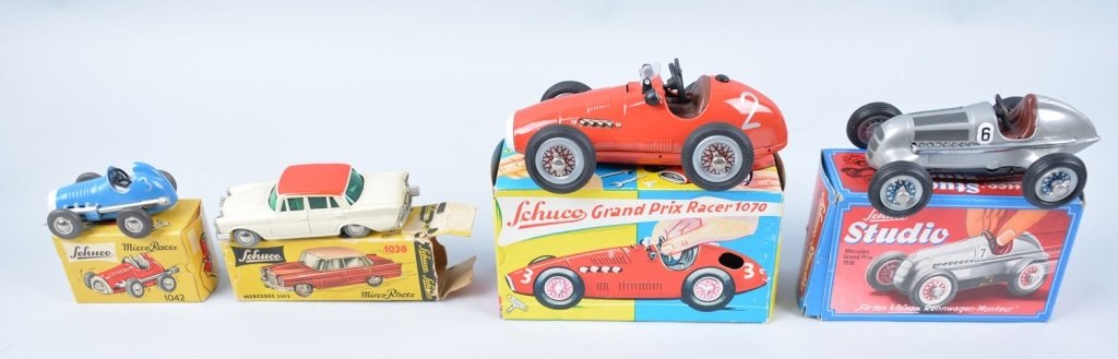 Lot of 4 SCHUCO VEHICLES: Includes Micro Racer, Studio Racer, Mercedes 220S, and Grand Prix racer. All Boxed. Excellent-Near Mint