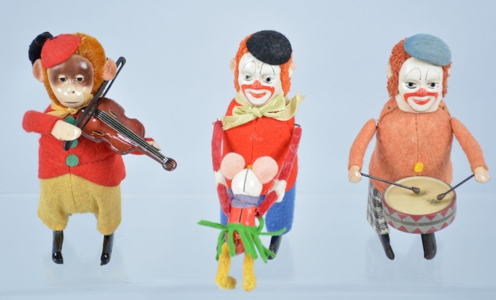 Lot of 3 WINDUP SCHUCO FIGURES: Includes Clown Drummer, Monkey with Violin, and Clown with Mouse. All original with great colors. Excellent