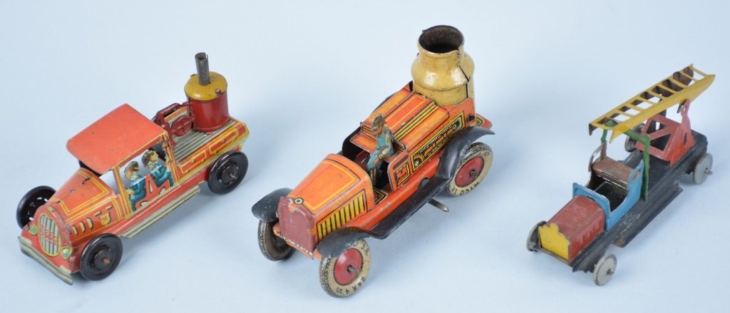 Lot of 3 PENNY TOY FIRE TRUCKS: Includes windup Rico Boiler, Paya Boiler, and German Ladder Truck. All original with great colors. Excellent
