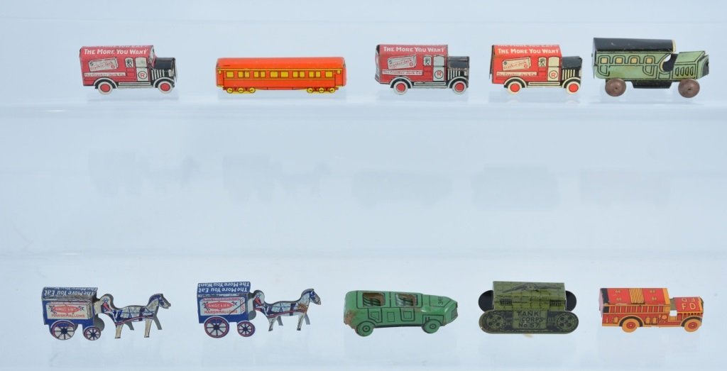 Lot of 10 VINTAGE CRACKER JACK TIN PRIZES: Includes 3 Trucks, 3 wagons, Train Car, Racer, Tank, and Fire Truck. Great colors. Excellent