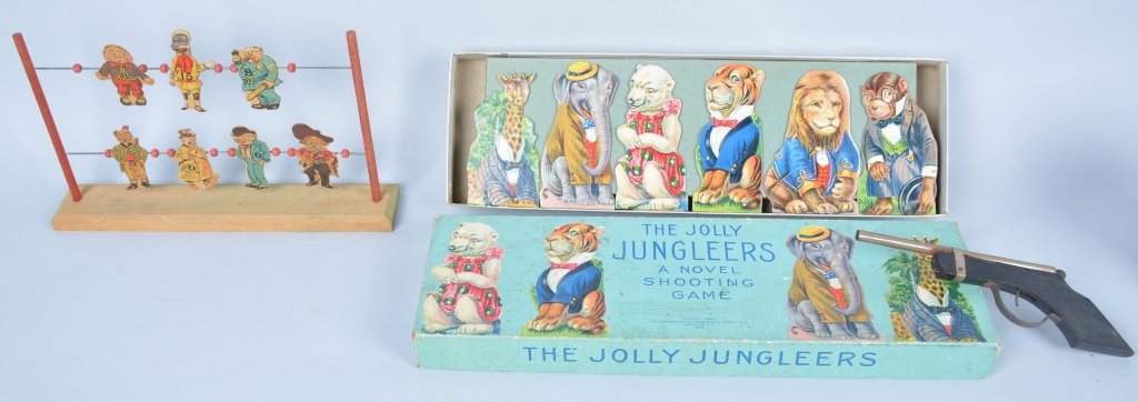 Lot of 2 Vintage Target Games with Cork Rifles: 1932 Jolly Junglers is excellent, with rifle, missing corks, The early comic chracter target has damage and no gun. Largest is 18" by 8".