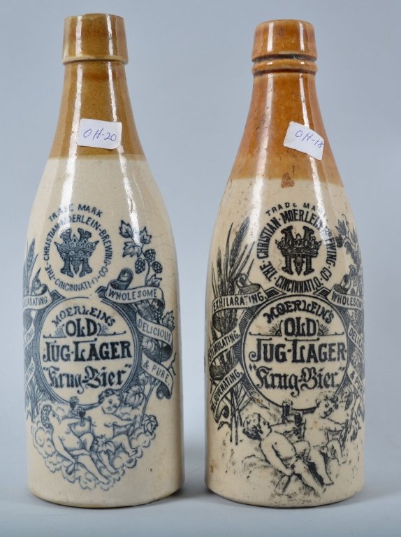 2- Moerlein Ginger Beer Bottles, Cinn, Ohio: Book # OH-18, OH-20, 1853-1920, 8 1/2", One has crazing and slight chip at lip, great graphics, and detail. Very Good - Excellent