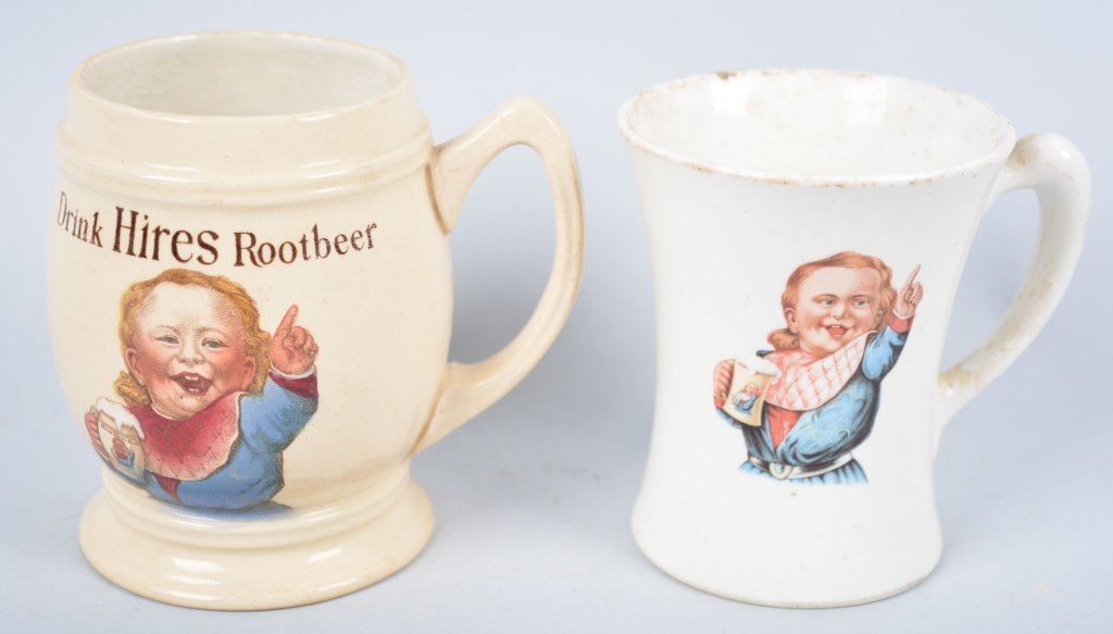 2-Hires Root Beer Mugs, Phila. PA: Book # Mug-59 and Mug-60, 1870-1980, Mug-59 Made in Germany, has chip repair under base, and hairline. Great colors and detail. Mug-60 Made in England. - Very Good