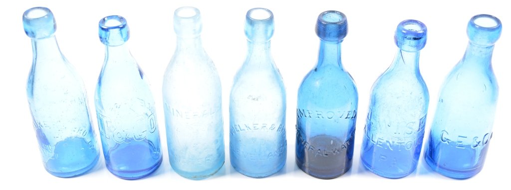 7-Blue Spring Water Bottles: 19th century blue bottles by various makers. Ohio, New York and Pennsylvania. 7 1/2". - Good-Very Good