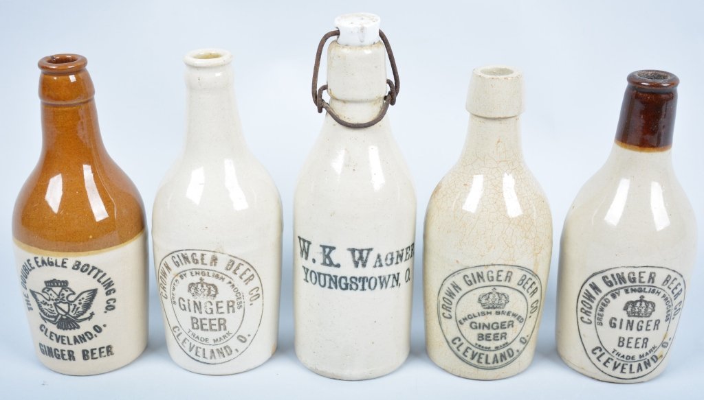 5-Ohio Ginger Beer Bottles: Double Eagle, 3-Crown, W.K. Wagner, from Cleveland, and Youngstown. 8 1/2", One crown bottle has crazing. Very Good-Excellent