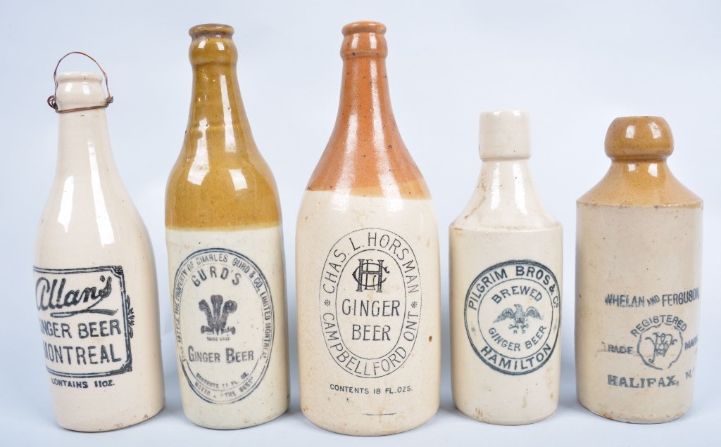 5-Canadian Ginger Beer Bottles: Whelan & Ferguson, Chas. Horman, Pilgrim Bros, Alan's, and Gurd's, from Montreal, Hamilton, Halifax, and Capbellford. 9 1/2", Pilgrim bottle has hairline,- Excellent