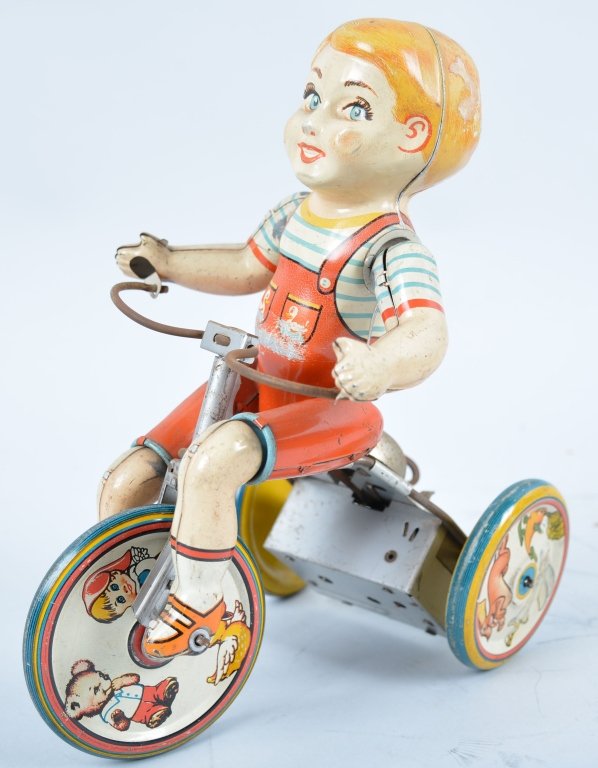 UNIQUE ART Tin Windup KIDDY CYCLIST: All original litho wheel version. Very Good