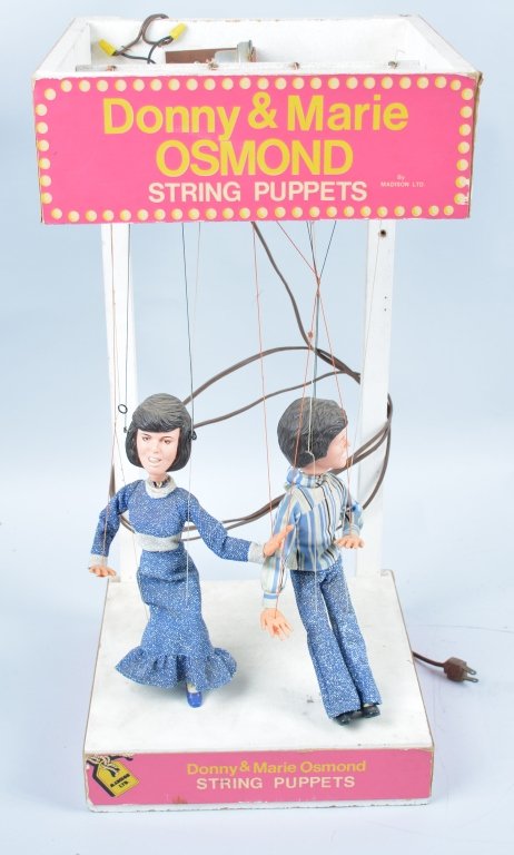 DONNIE and MARIE OSMOND String Puppet STORE DISPLA: Very unusual motorized store display. Very detailed puppets. Excellent