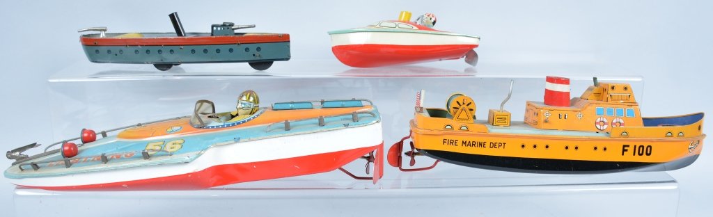 Lot of 4 TIN BOATS: Includes Hess Battleship, 56 Lightning Boat, Steam Boat, and Fire Boat. Some missing parts. Very Good