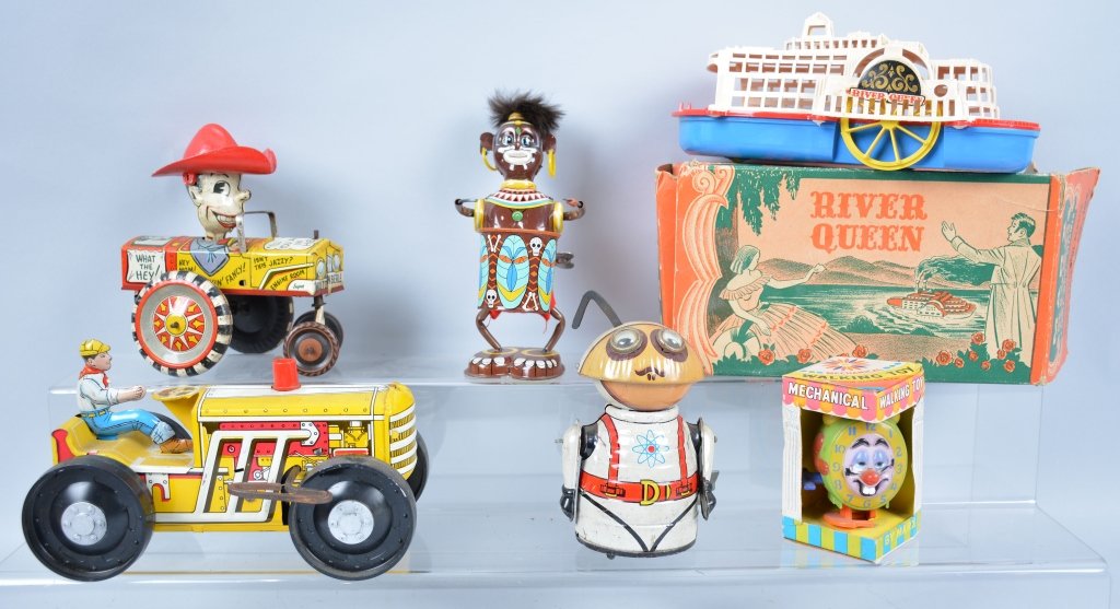 Lot of 6 MARX TOYS: Includes Milton Berel Car, Tractor, Walking Clock with Box, Space Beetle, River Queen with Box, and Native Drummer. Some missing parts. Very Good-Excellent