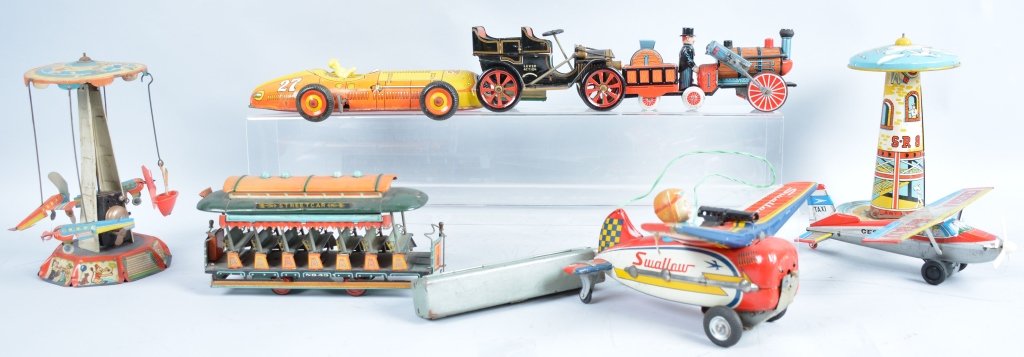 Lot of 8 TIN TOYS: Includes Marx Racer, Cessna Airplane, Trolly, Sail Way Toy, and others. Some missing parts. Very Good-Excellent