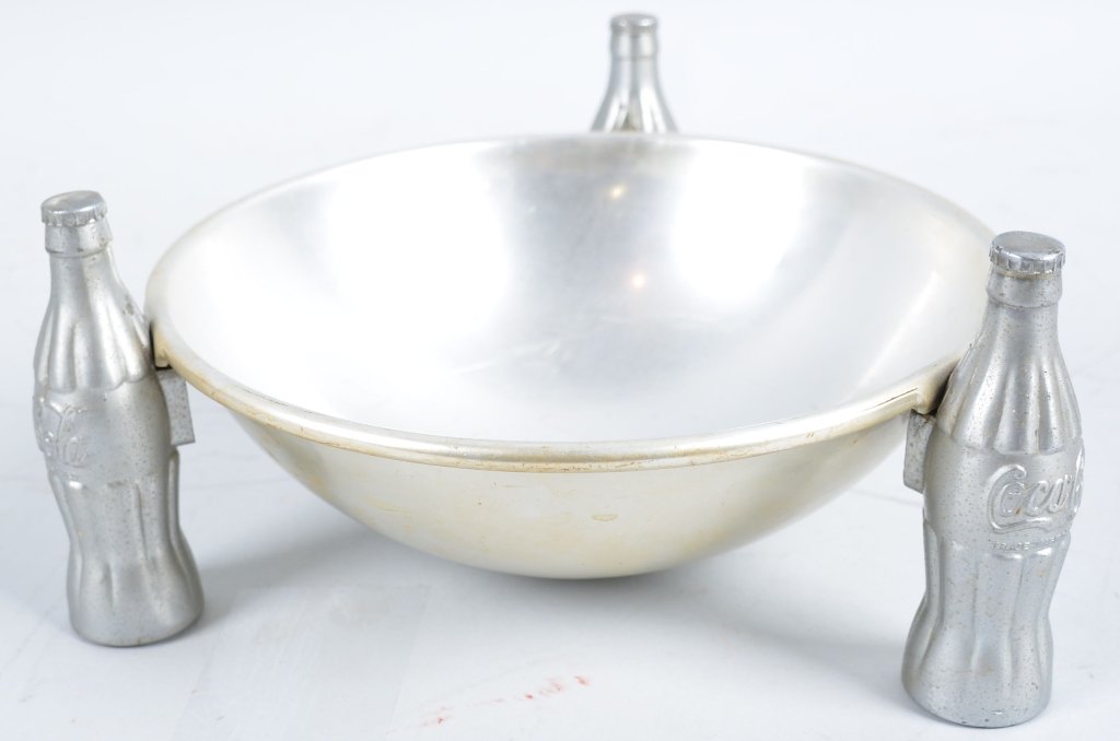 1935 Metal Coca Cola Bowl by Brunhoff: 8"x4" metal bowl with 3 Coke Bottles for legs. Dated 1935 on bottom. Excellent