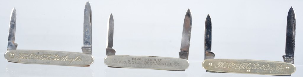 Lot of 3 1930s Coca Cola Pocket Knives: All original one with compliments of bottling company. Blades all marked with makers names. Excellent