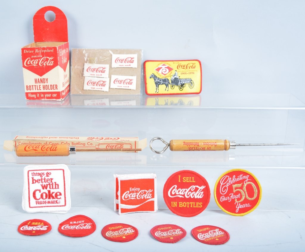 Coca Cola Lot: Lot includes many patches, Bottle holder in box. Ice picks, apron, and more. Excellent