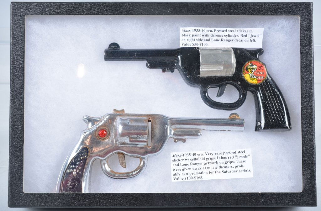 2-Marx 1930's Lone Ranger Tin Guns: Black Marx gun is excellent working, silver gun with jewels and celluloid grips is a premium, and is very good, -Very Good-Excellent