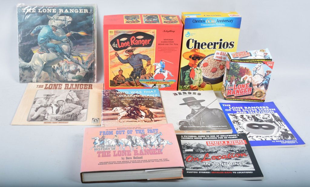 Large Lot of Lone Ranger Items: Shylling tin windup toy, MIB, several books, several record albums, cassette tape set, and Cheerios box, Very Good-excellent