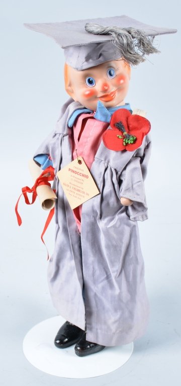 Ralph Freundlich PINOCCHIO GRADUATE DOLL: All original and complete with tag. 16" Tall. Excellent