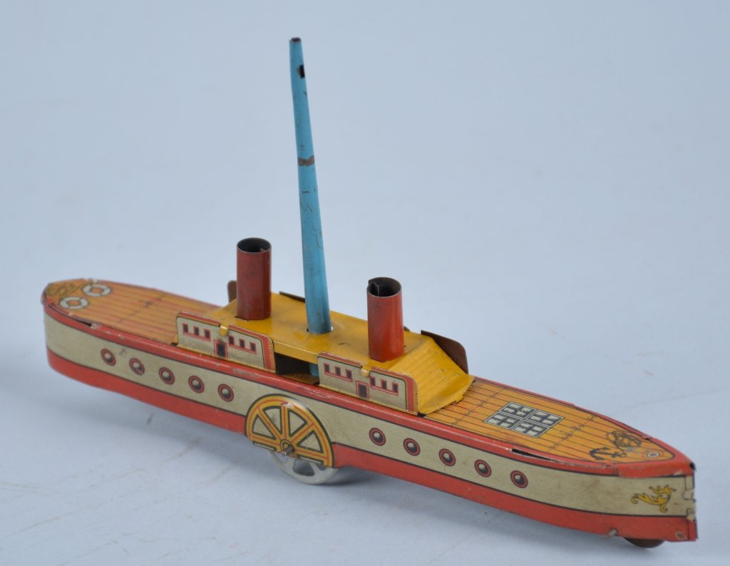 German SIDEWHEEL PADDLE BOAT PENNY TOY: Beautiful Penny Toy. Great detail on boat. Has original flag pole. Excellent