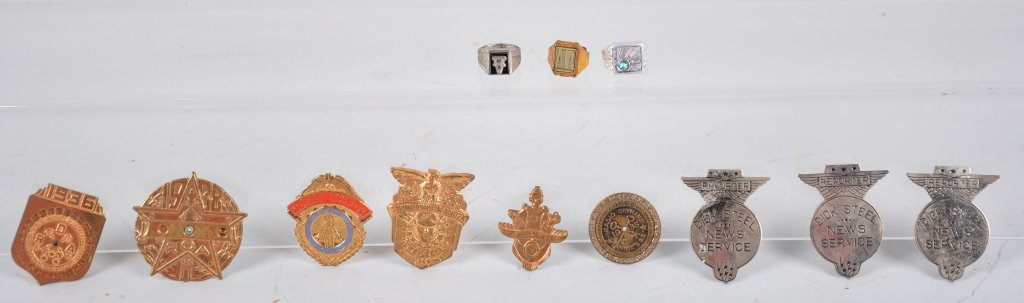 Lot of 12 PREMIUM RINGS and BADGES: Includes Buck Rogers Solar Scout, 1935, 1936, 1938 Orphan Annie, 4 Dick Steel Bagdes, Lone Ranger Safety Scout, AA Premium Ring, and 2 other premium rings. Excellent