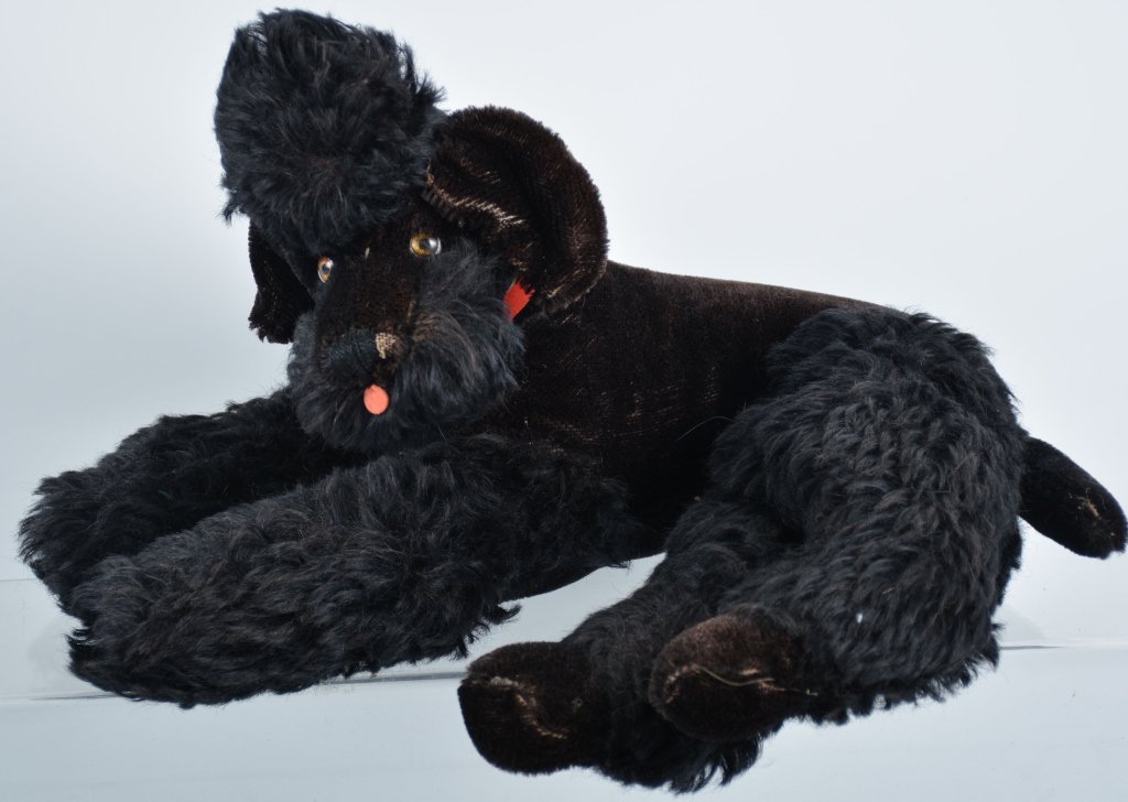 STEIFF SNOBBY POODLE: Vintage laying Snobby Poodle. Nice early Button with tag. 16" Excellent
