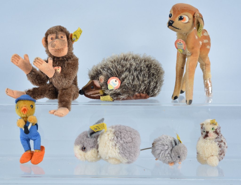 Lot of 8 STEIFF ANIMALS: Lot includes 6" Bambi, 6" Jocko, 5" Joggi, 4" Rabbit, 4" Sailor Duck, mini Mouse, and Mini Cat. Somne wuth buttons and tags. Very Good-Excellent