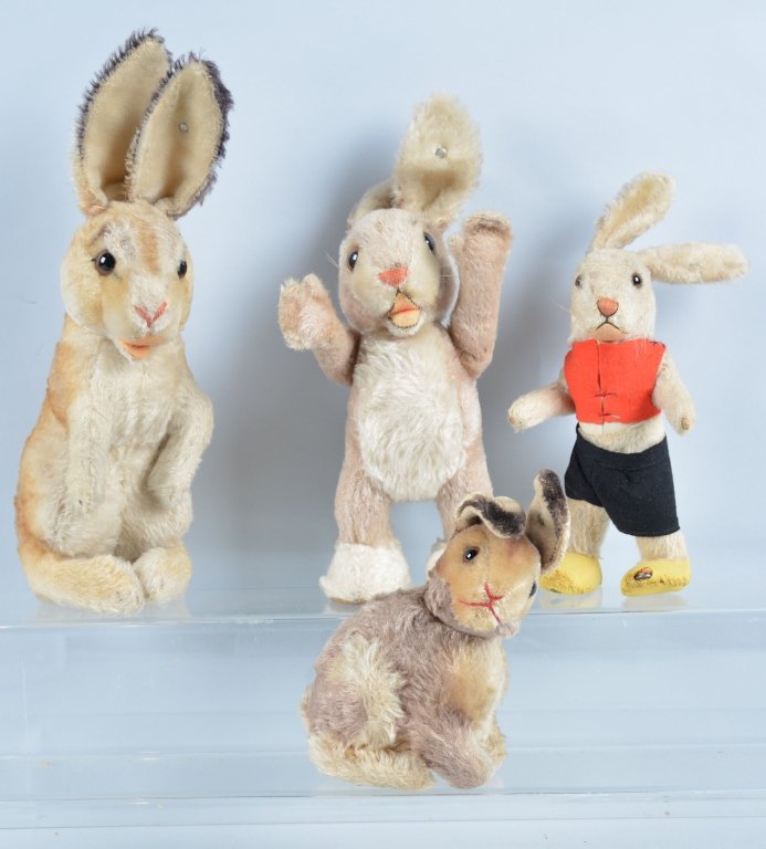 Lot of 4 STEIFF RABBITS: Nice early buttons. Includes 14" Sitting Up Rabbit, 12" Standing Rabbit, 7" Siting Rabbit, and 9" Dressed Rabbit. With buttons. Excellent