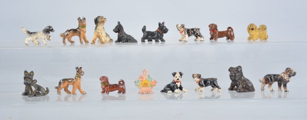Lot of 17 Miniature Cast Iron Dogs: Probably by Hubley, with nice detail and colors, Largest 2 1/2", Good-Very Good