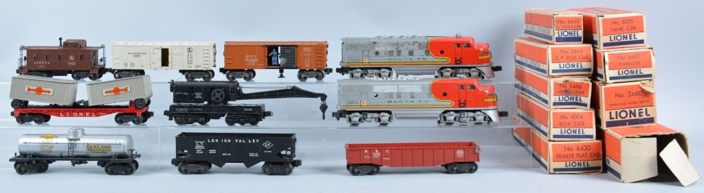 Lionel #2332 Santa Fe Catalog Set: Set includes #2343 A&B Santa Fe Engines, #6555 Tank Car, #6456 Hopper Car, #3464 SF Box Car, #6430 Trailer Flat Cat, #6004 Box Car, #6462 Gondola Car, #2460 Operatinbg Work Crane, and #6457 Caboose. W