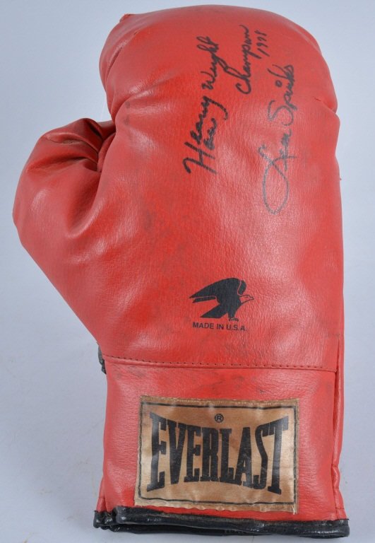 LEON SPINKS AUTOGRAPHED FIGHT USED BOXING GLOVE: Fight used Everlast Boxing Glove autographed Heavy Weight Champion 1978 Leon Spinks. Excellent