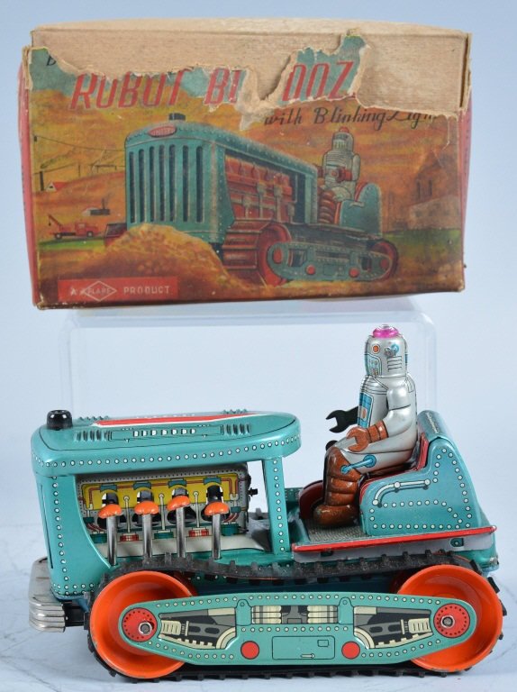 JAPAN Battery Op ROBOT BULLDOZER w/Box: Very scarce Space Toy. Has full body Robot driver with light on head. Tractor has great colors and litho. With box. Excellent