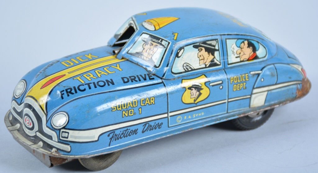 MARX Tin Friction DICK TRACY SQUAD CAR Blue Versio: This is the smaller version in scarce Blue. Great colors and graphics. Some minor wear to bottom rear edge. Very Good