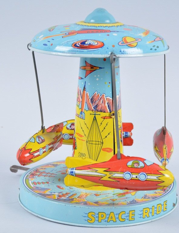 CHEIN Tin Windup SPACE ROCKET RIDE: Hard to find Chein toy. Has excellent Space graphics throughout the toy. Very nice colors. Works, Excellent