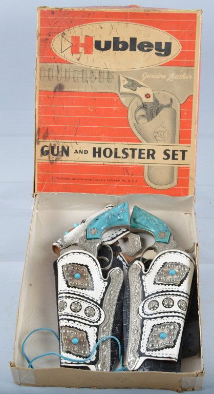 HUBLEY TURQUOISE 2 GUN HOLSTER SET w/Box: Very rare set! Possibly the most beautiful and highly detailed Gun set every produced! Includes leather 2 gun holster decortaed with metal and turquoise. Plus 2 Hubley Texan Jr Cap Guns with Turquoise